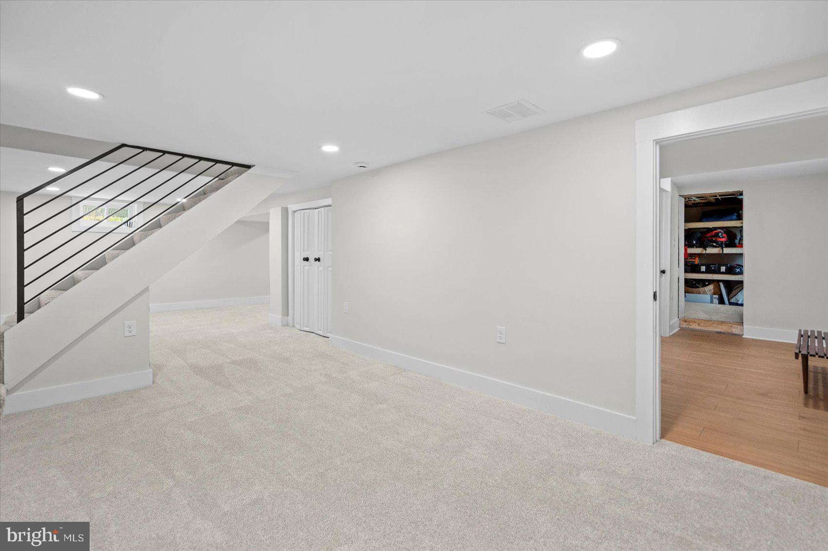 510 Overcrest Road Towson, MD 21286 - Photo 30 of 47 an empty room with wooden floor and cabinet