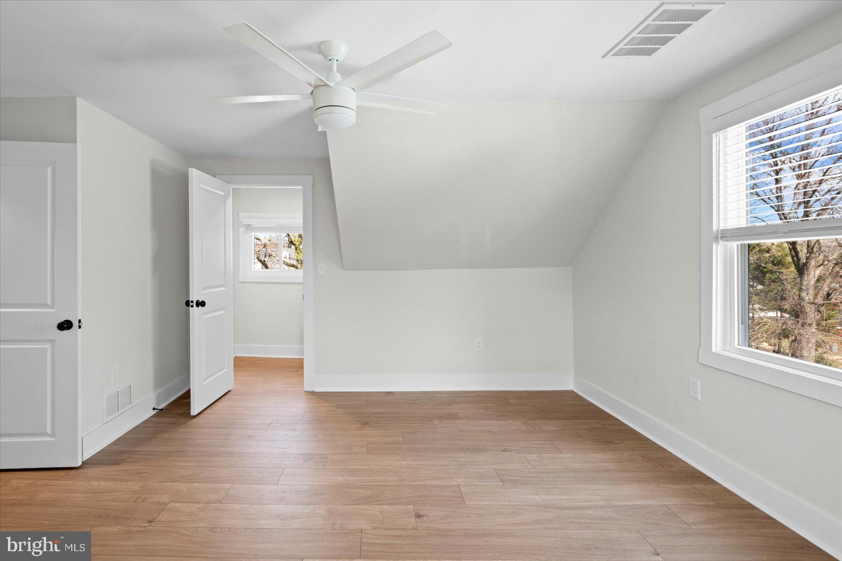 510 Overcrest Road Towson, MD 21286 - Photo 34 of 47 wooden floor in an empty room with a window