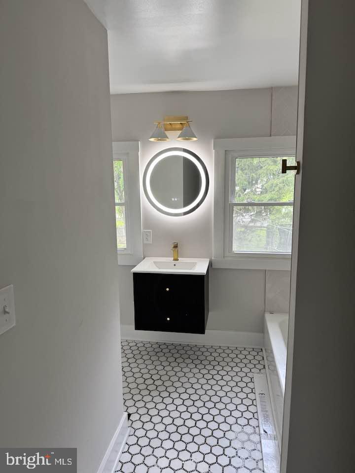 510 Overcrest Road Towson, MD 21286 - Photo 5 of 47 a bathroom with a sink a toilet and a window