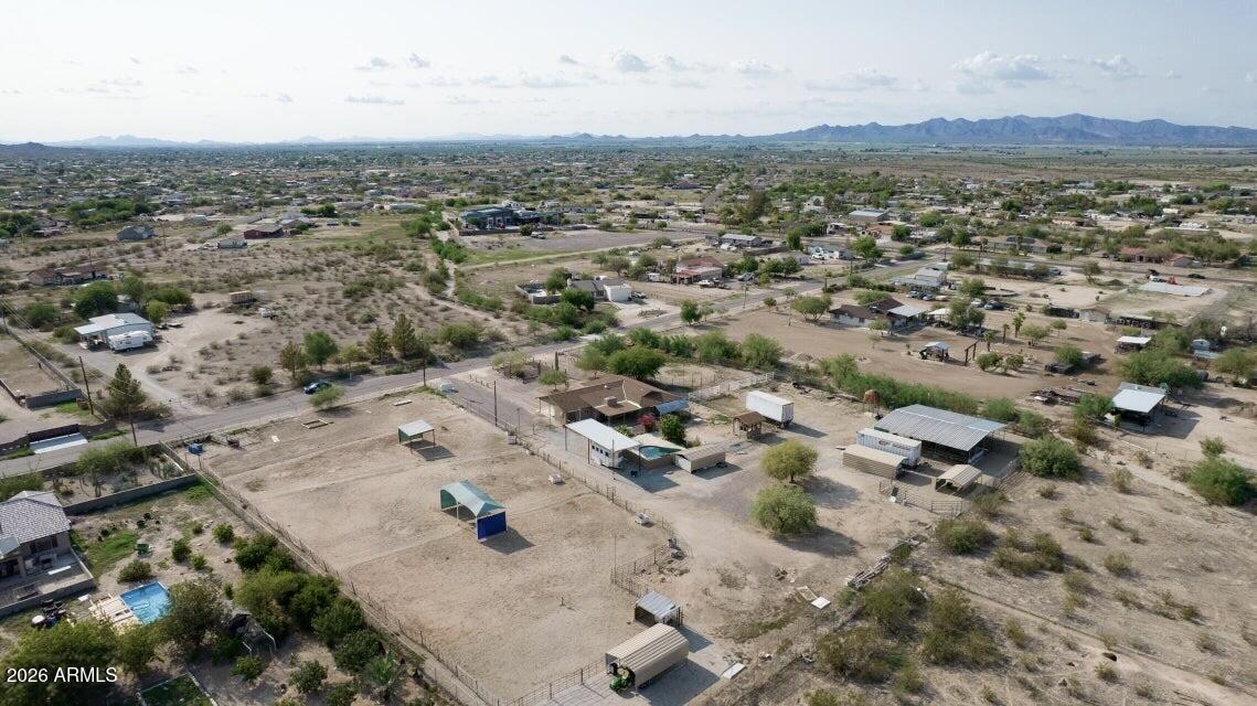 13401 South Kiva Road, Unit 186 Buckeye, AZ 85326 - Photo 1 of 1 an aerial view of residential houses with outdoor space