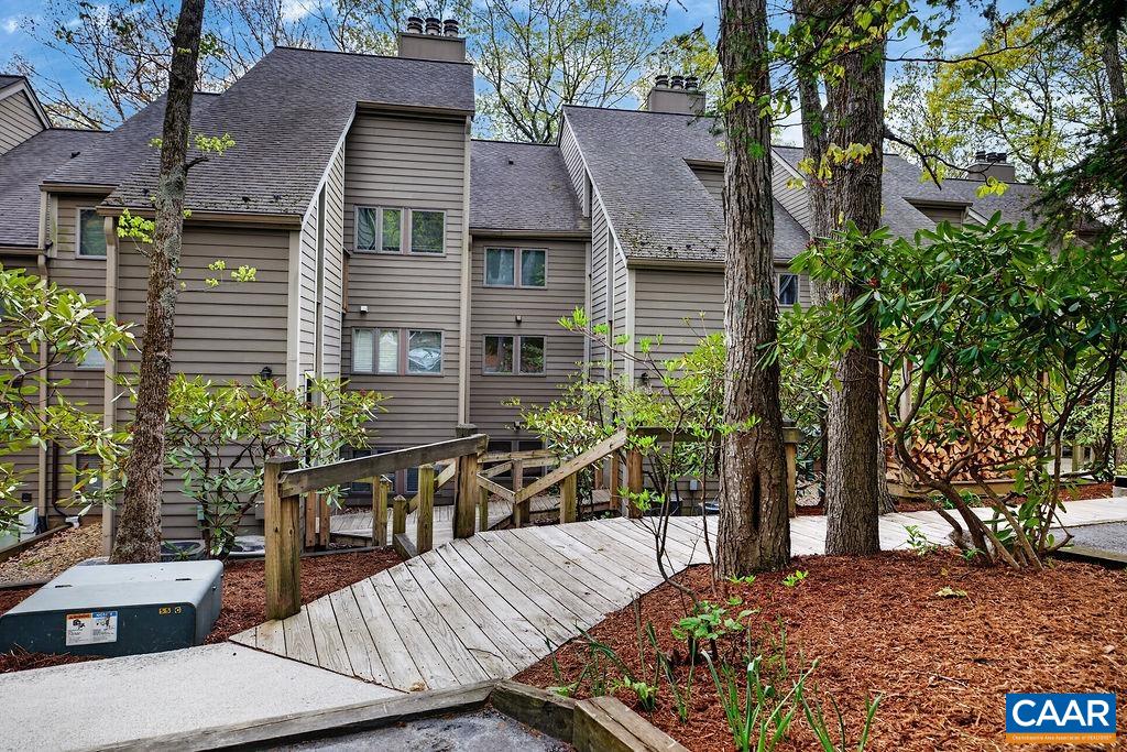 410 Three Ridges Roseland, VA 22967 - Photo 2 of 21 a view of a house with backyard and sitting area