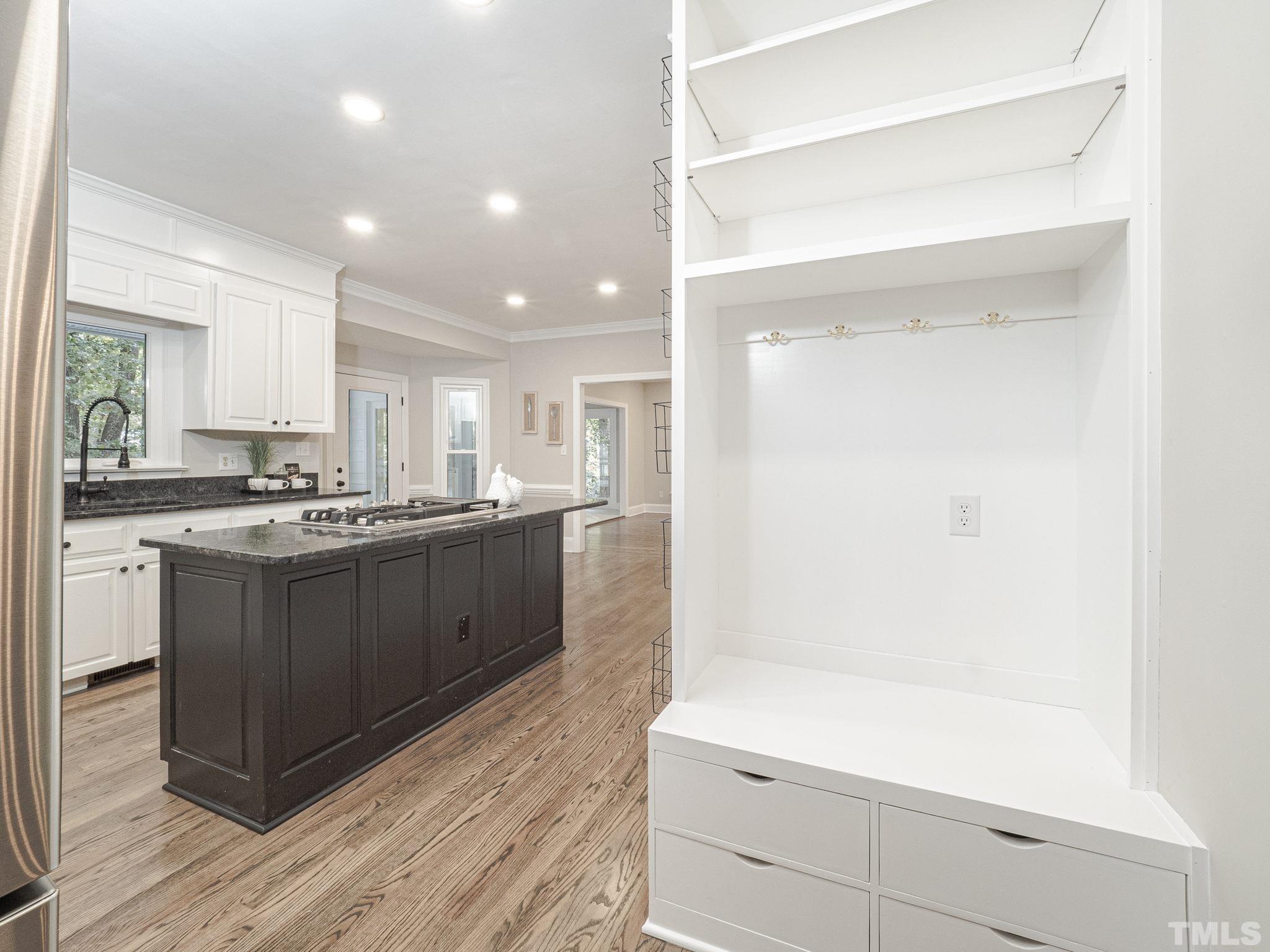 11936 Appaloosa Run East Raleigh, NC 27613 - Photo 17 of 30 a kitchen with a sink and cabinets