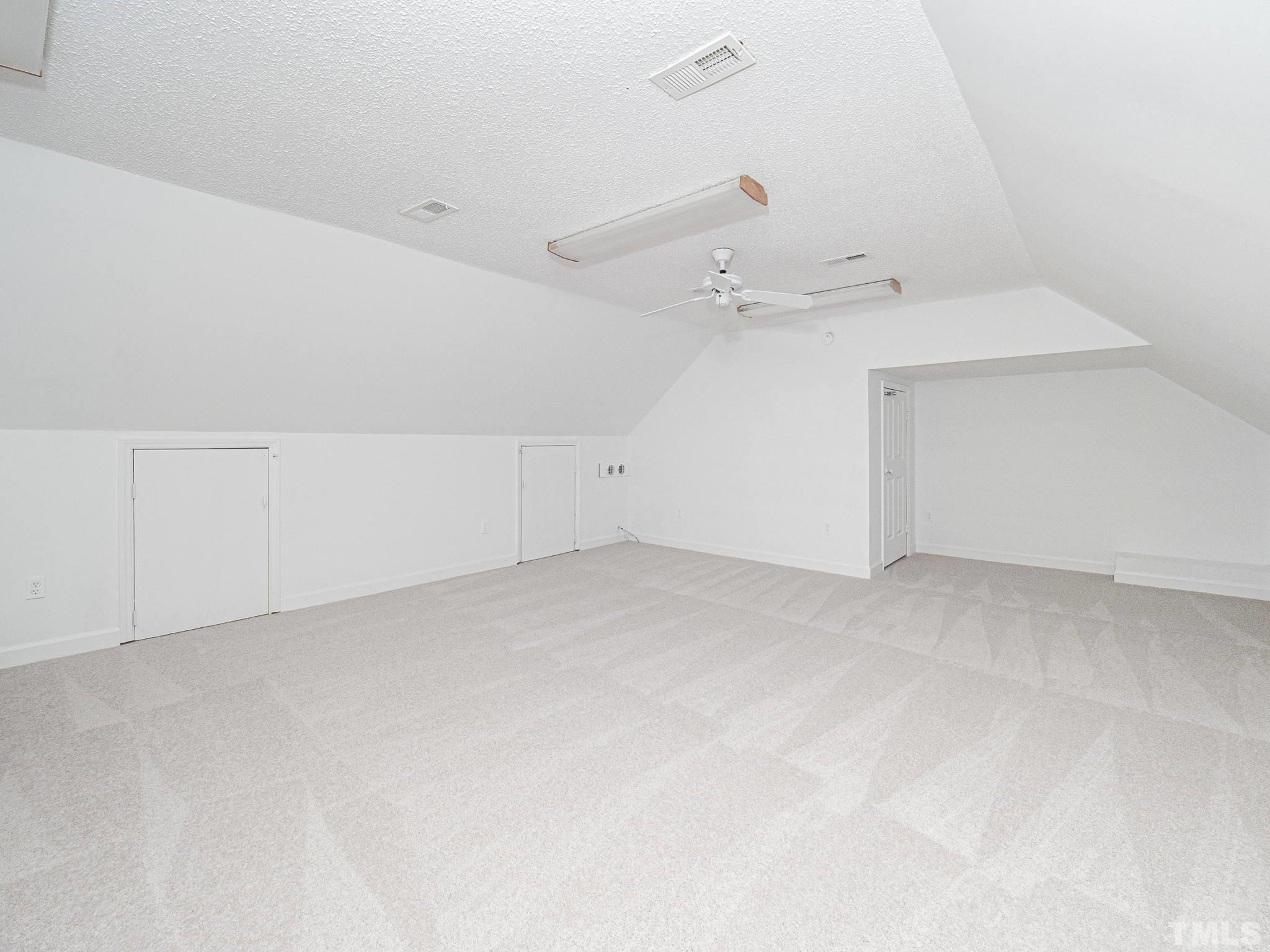 11936 Appaloosa Run East Raleigh, NC 27613 - Photo 27 of 30 a view of an empty room