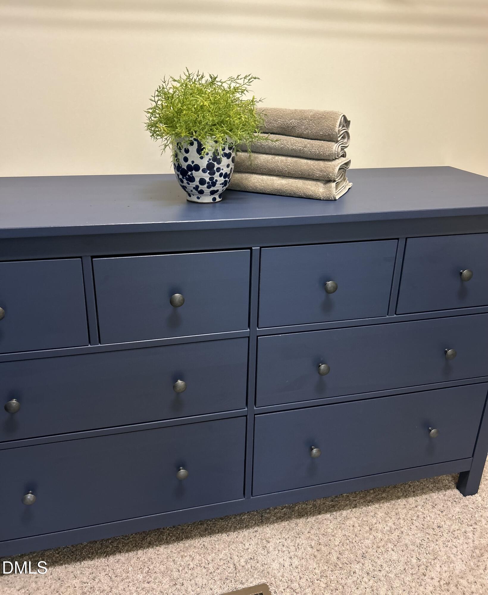634 Edgewater Ridge Court Apex, NC 27523 - Photo 15 of 23 a view of a dresser
