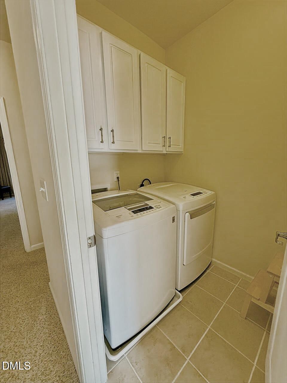 634 Edgewater Ridge Court Apex, NC 27523 - Photo 18 of 23 a utility room with dryer and washer