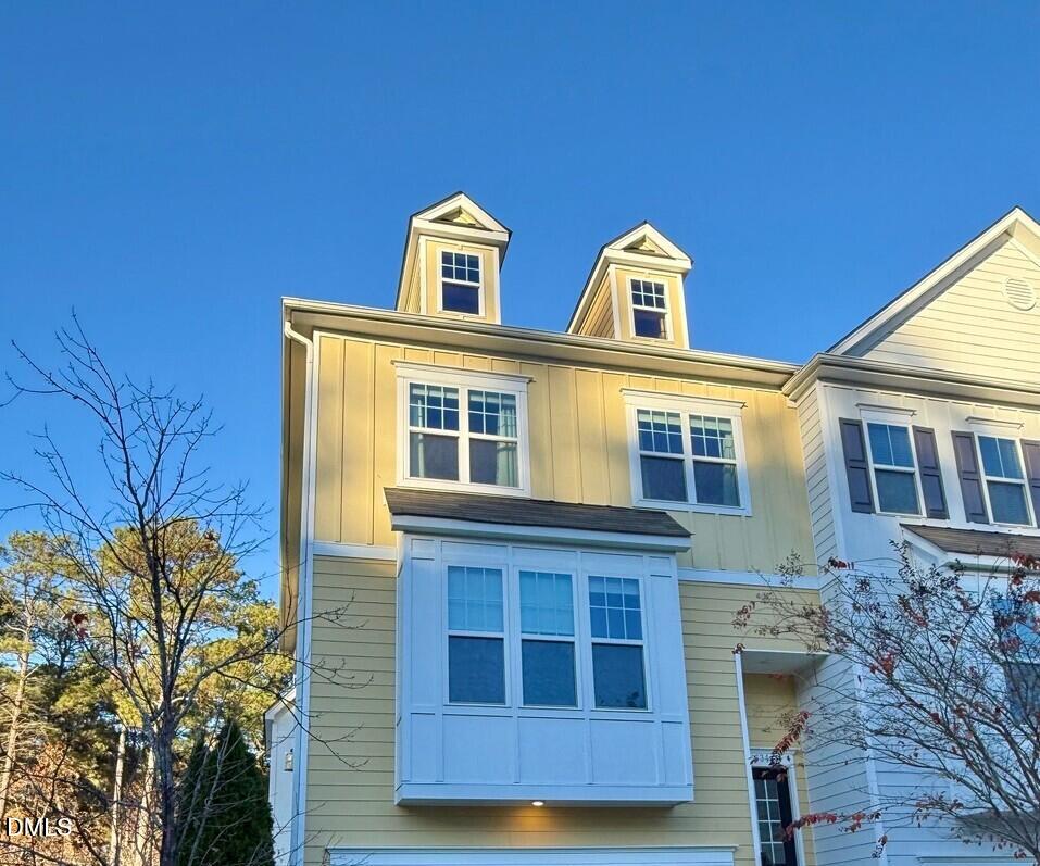 634 Edgewater Ridge Court Apex, NC 27523 - Photo 2 of 23 a front view of a house with a yard