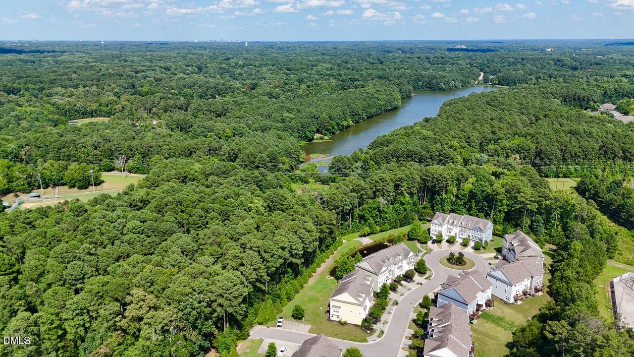 634 Edgewater Ridge Court Apex, NC 27523 - Photo 23 of 23 an aerial view of a house with a yard