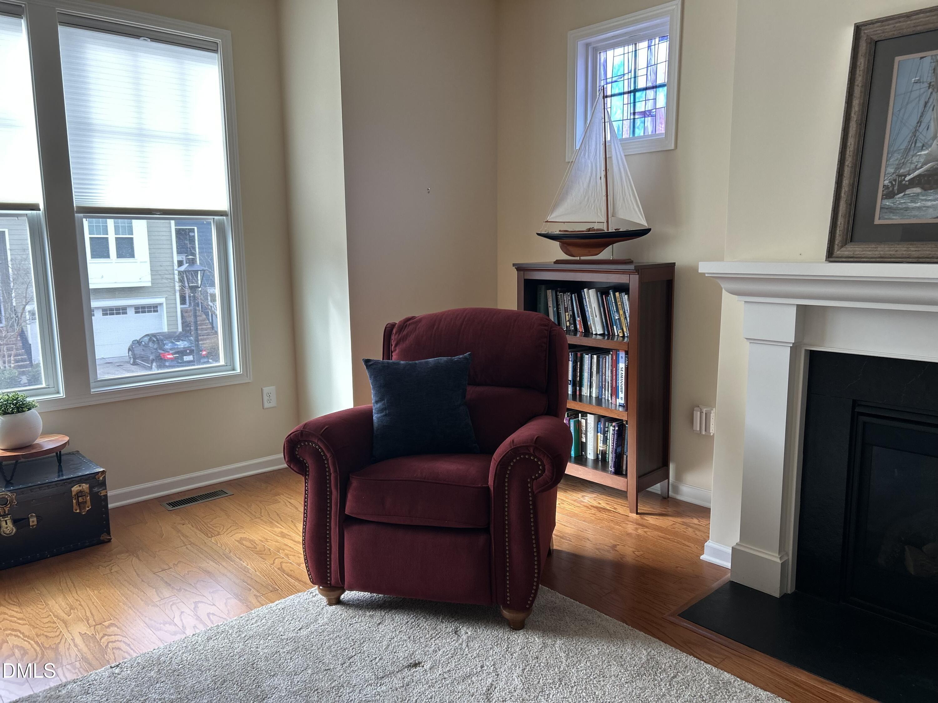 634 Edgewater Ridge Court Apex, NC 27523 - Photo 8 of 23 a living room with furniture and a window
