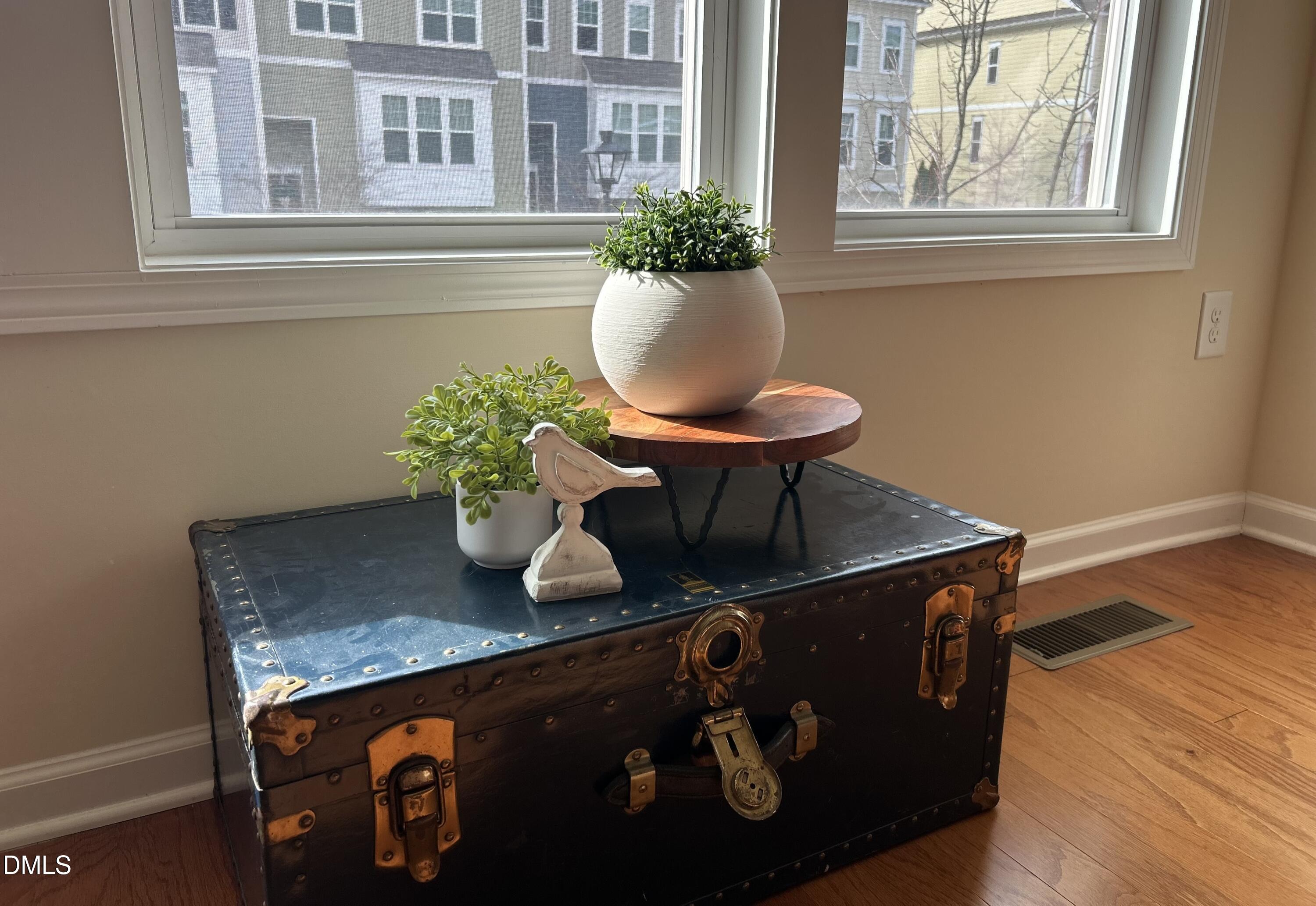 634 Edgewater Ridge Court Apex, NC 27523 - Photo 9 of 23 a vase of flowers sitting on a table
