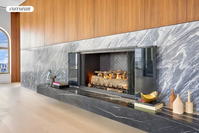 a kitchen with a table and chairs in it