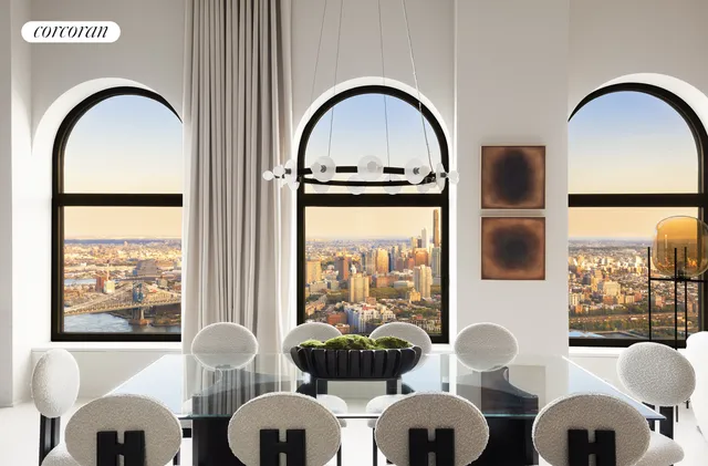 a bathroom with a granite countertop sink and a large mirror