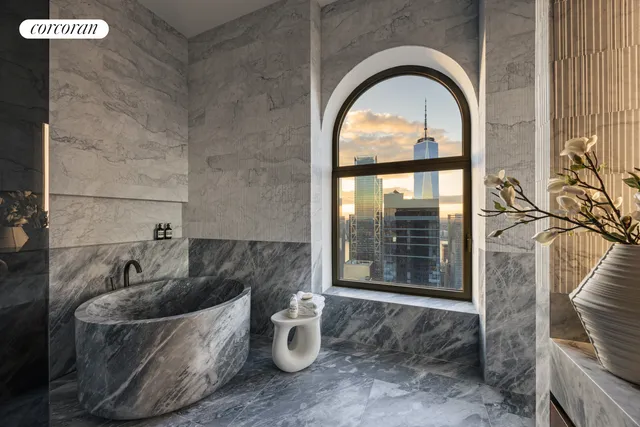 a view of an entryway door with a hallway