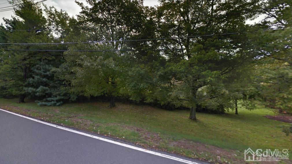 169 Old Beekman Road Monmouth Junction, NJ 08852 - Photo 1 of 3 a view of a lush green space