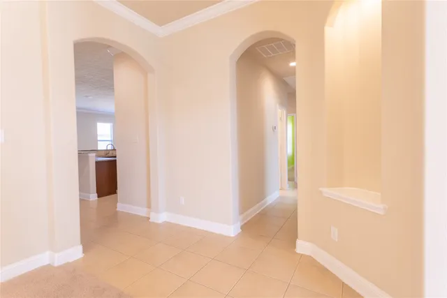 a view of a room with an entryway