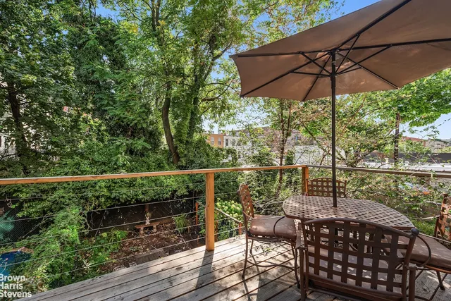 a kitchen with a refrigerator and a sink