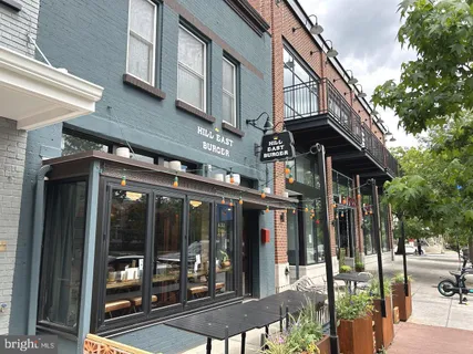 a kitchen view of a dining table and chairs