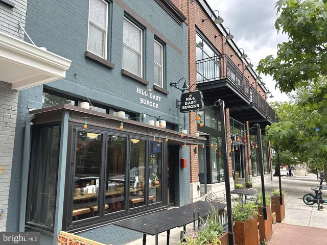 a kitchen view of a dining table and chairs