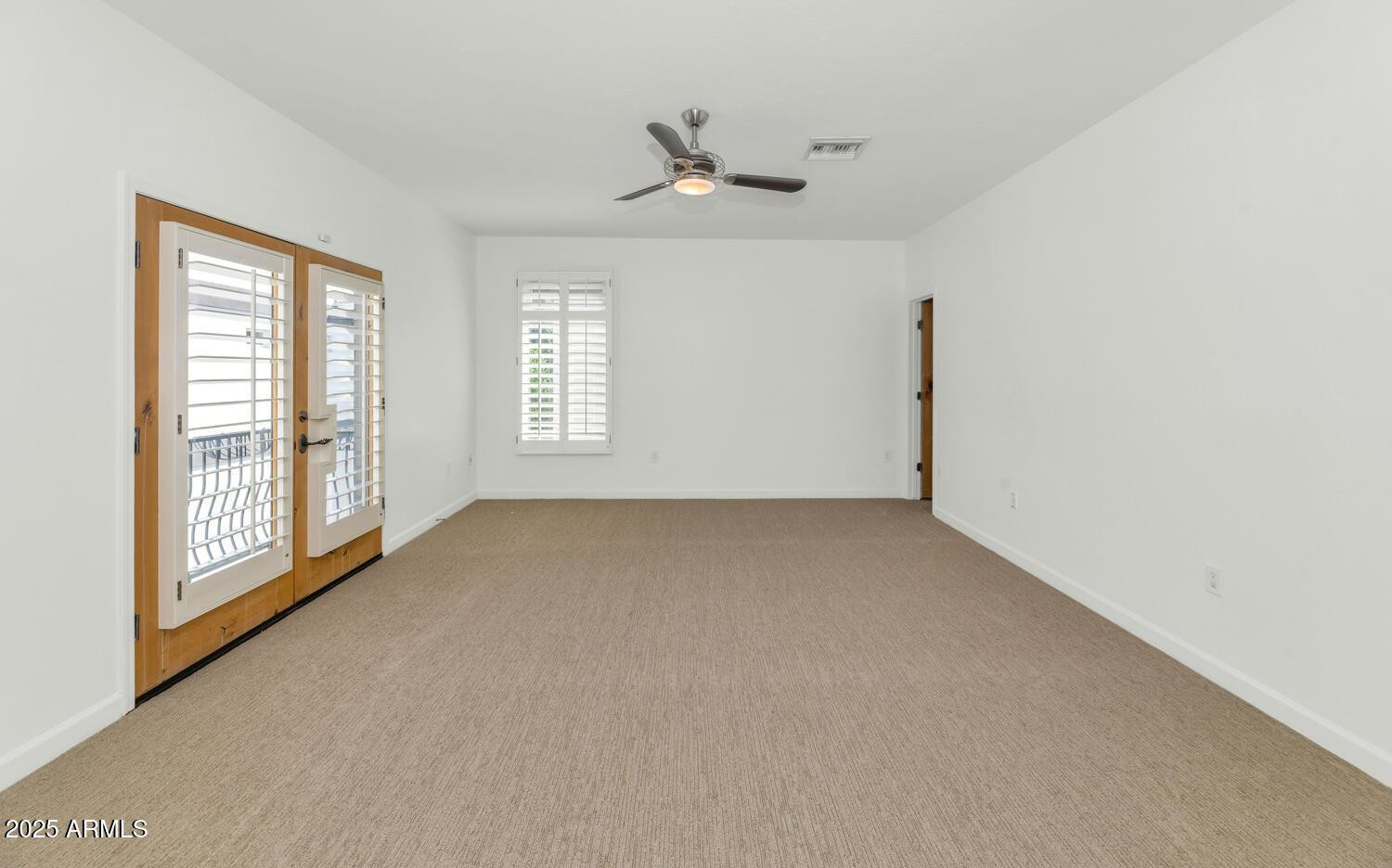 229 West Portland Street Phoenix, AZ 85003 - Photo 15 of 26 a view of an empty room with a window