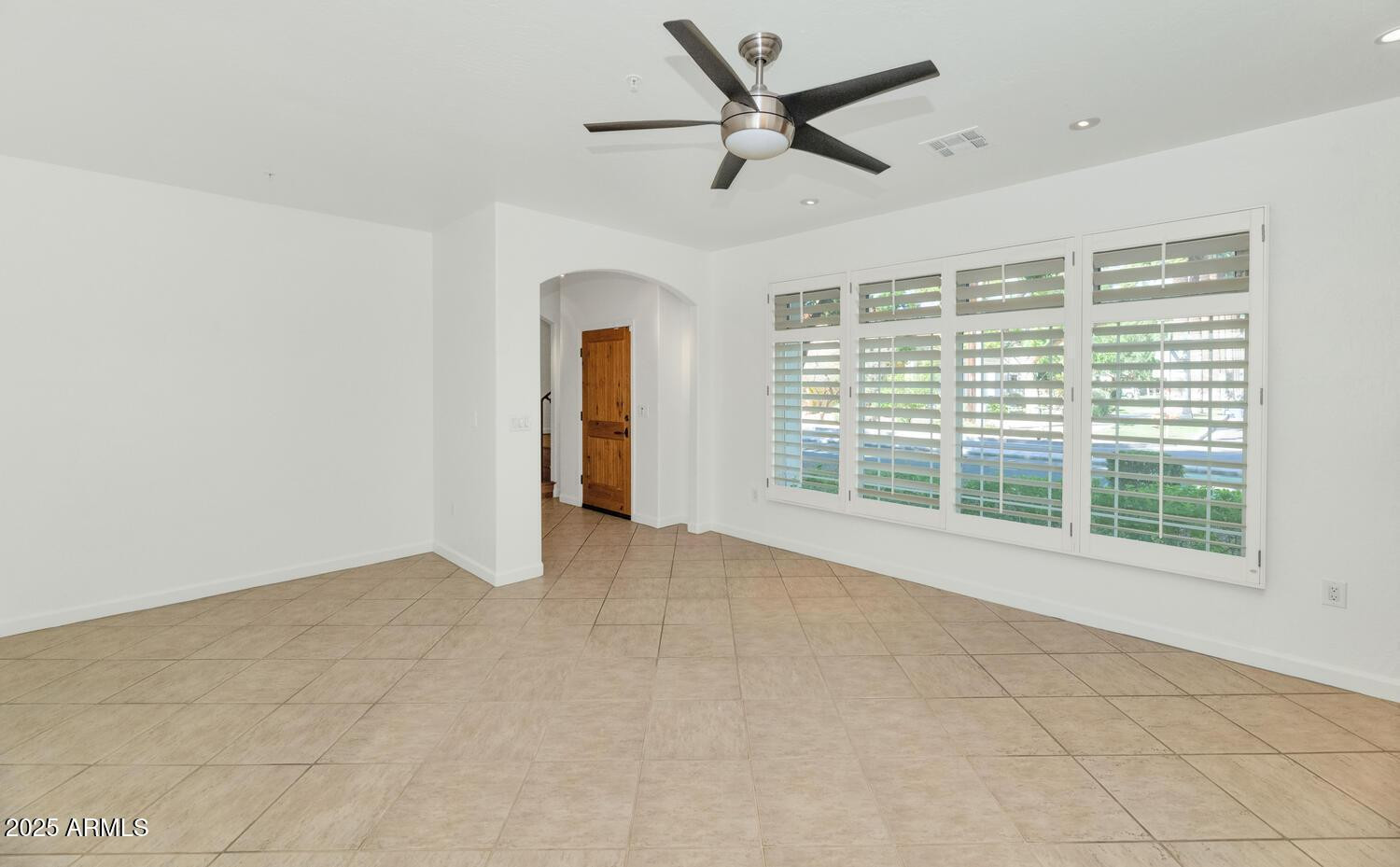 229 West Portland Street Phoenix, AZ 85003 - Photo 2 of 26 a view of an empty room with a window