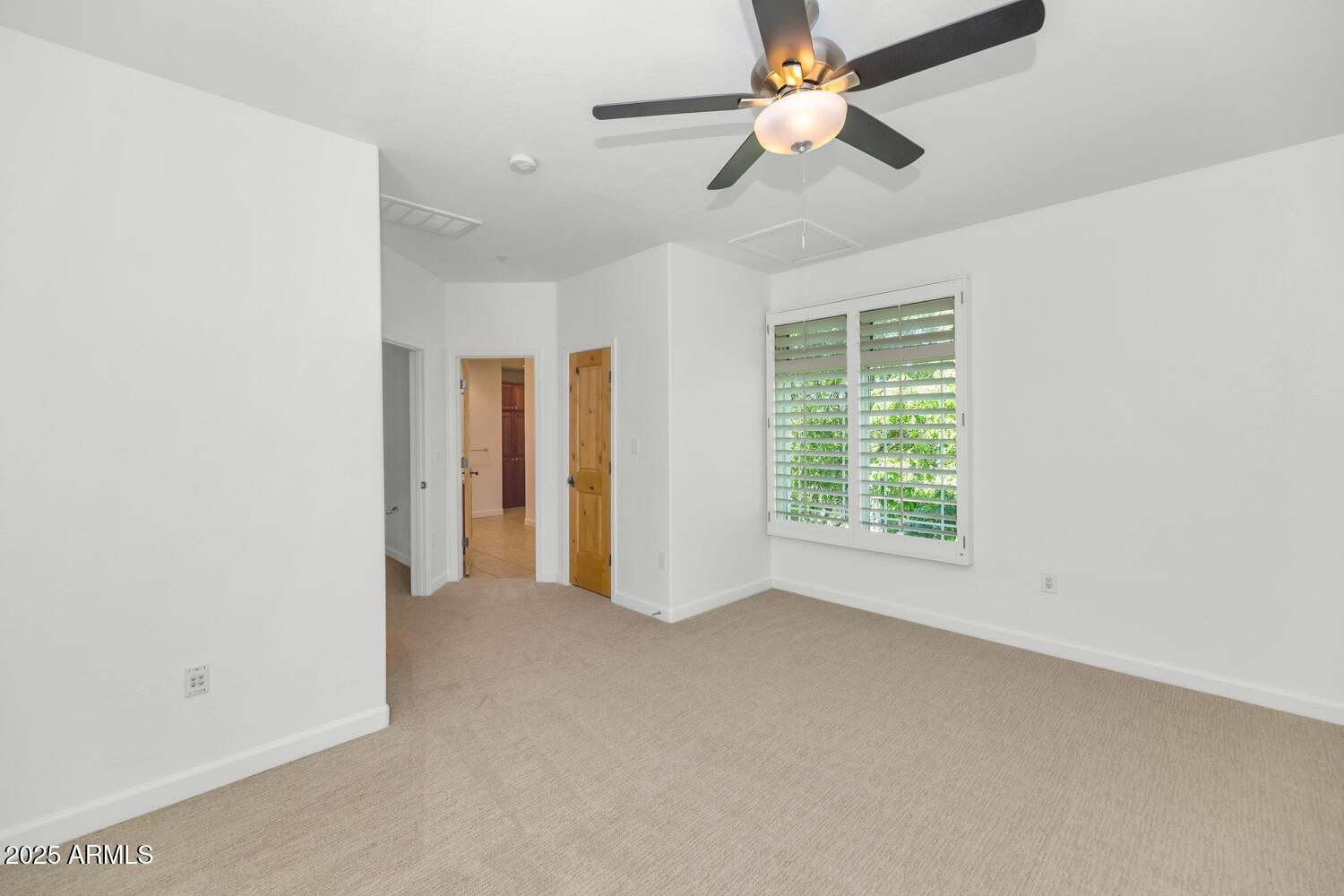 229 West Portland Street Phoenix, AZ 85003 - Photo 21 of 26 a view of an empty room with a window
