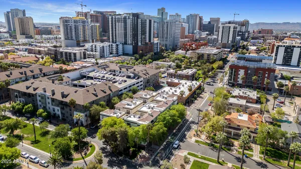 a view of a city with tall buildings