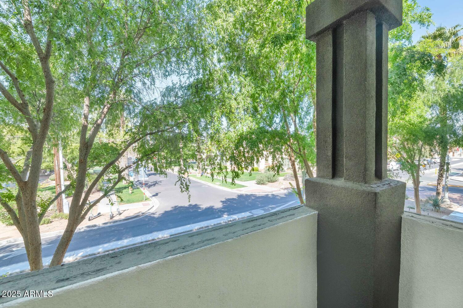 229 West Portland Street Phoenix, AZ 85003 - Photo 8 of 26 a view of a house with a tree