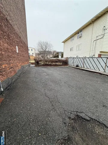 a view of a truck parked in back of a house