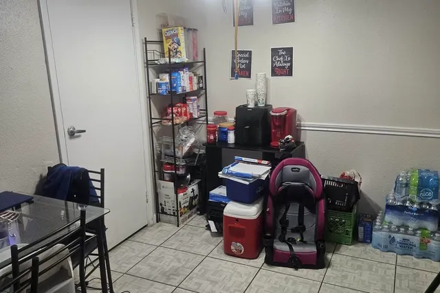 a view of a workspace with furniture