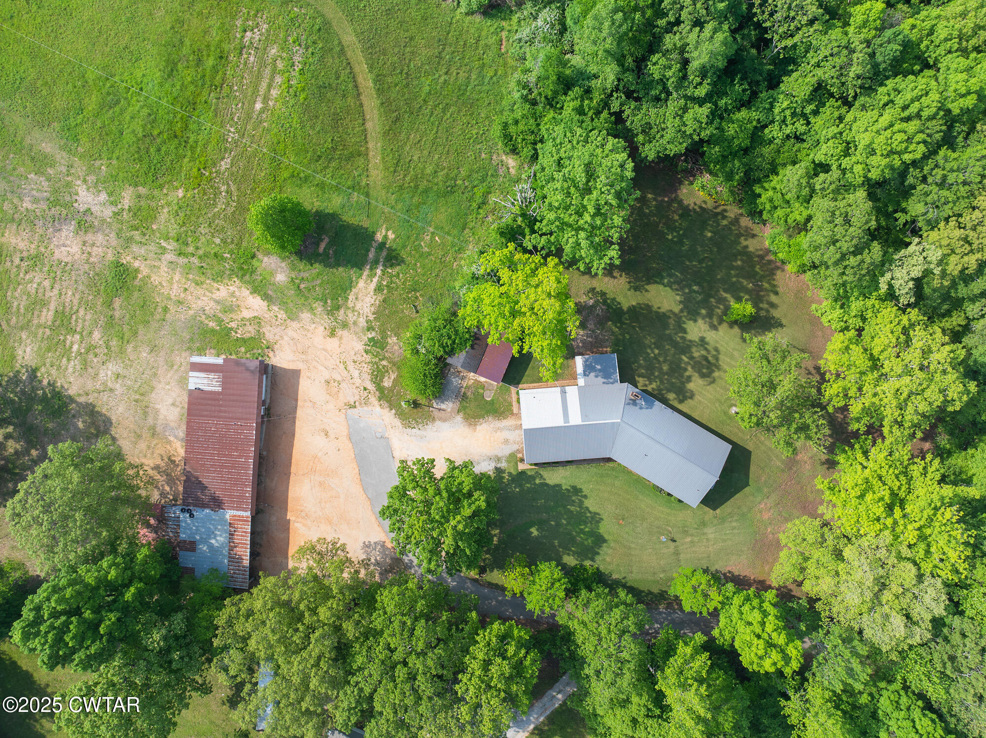 210 Martin Lane Decaturville, TN 38329 - Photo 29 of 48 DJI_20250430092217_0202_D