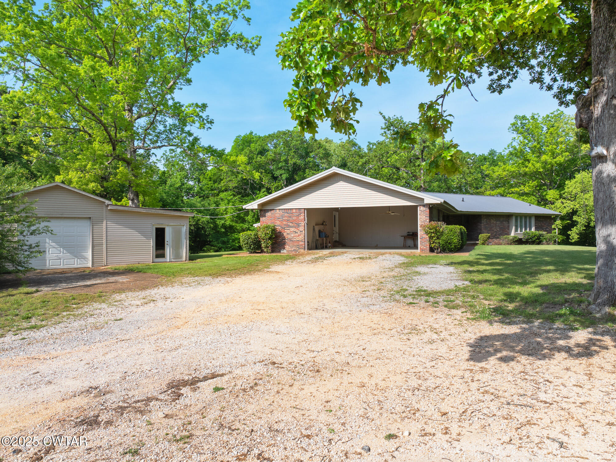 210 Martin Lane Decaturville, TN 38329 - Photo 3 of 48 DJI_20250430091904_0195_D