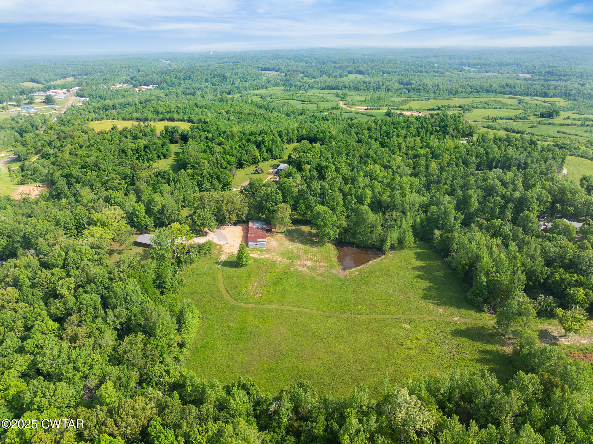 210 Martin Lane Decaturville, TN 38329 - Photo 32 of 48 DJI_20250430092355_0205_D