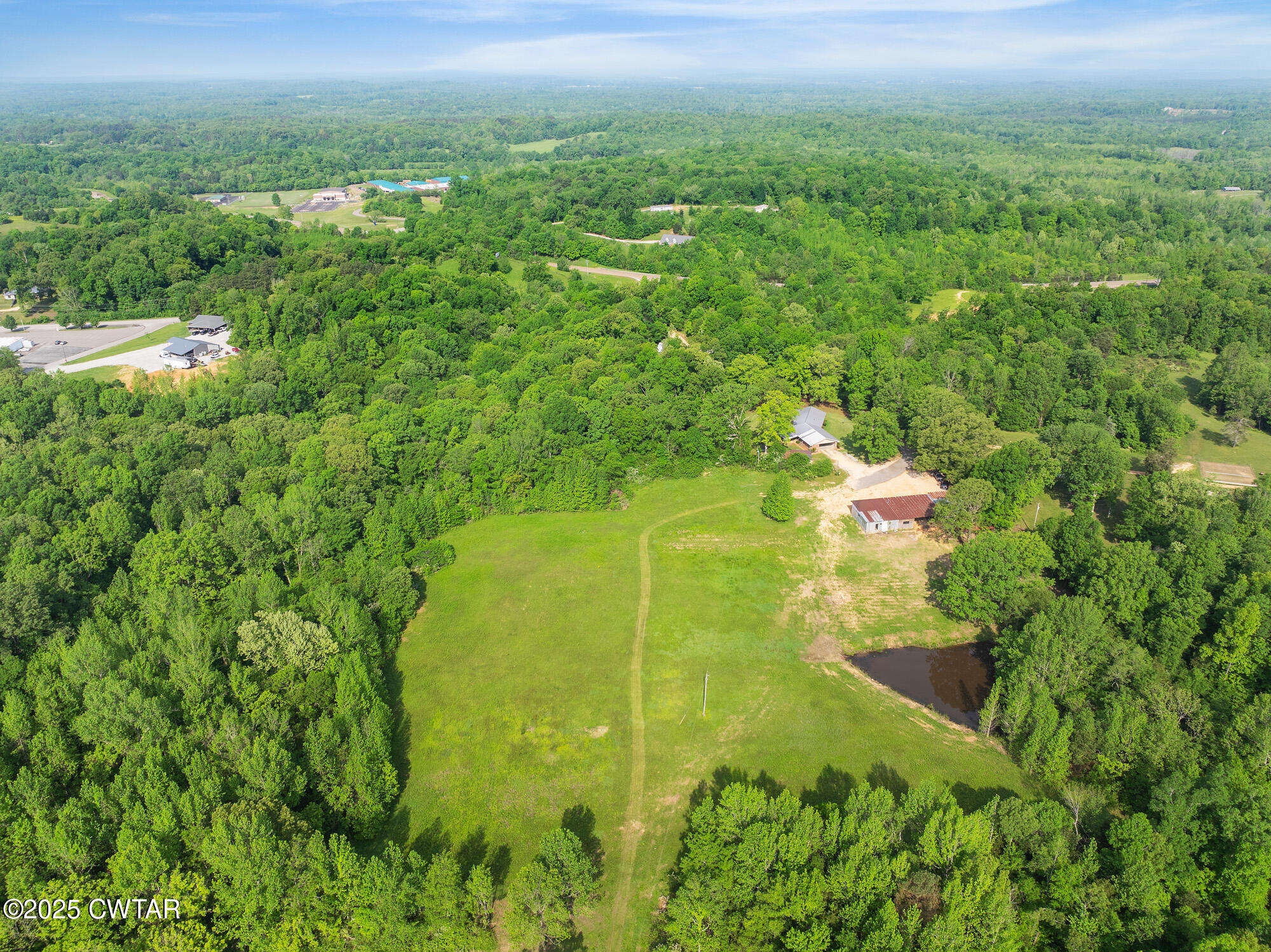 210 Martin Lane Decaturville, TN 38329 - Photo 33 of 48 DJI_20250430092419_0206_D