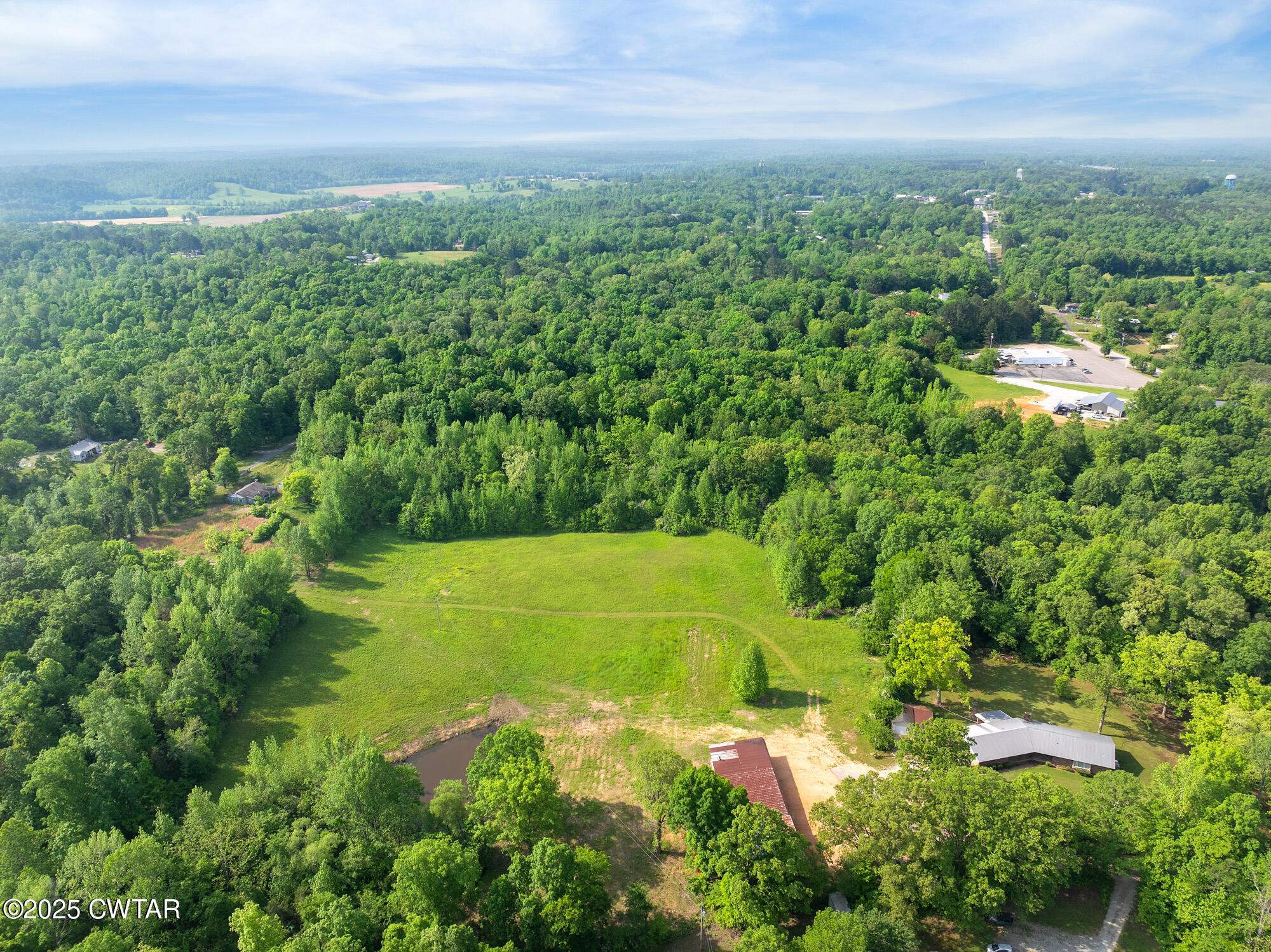 210 Martin Lane Decaturville, TN 38329 - Photo 34 of 48 DJI_20250430092450_0207_D