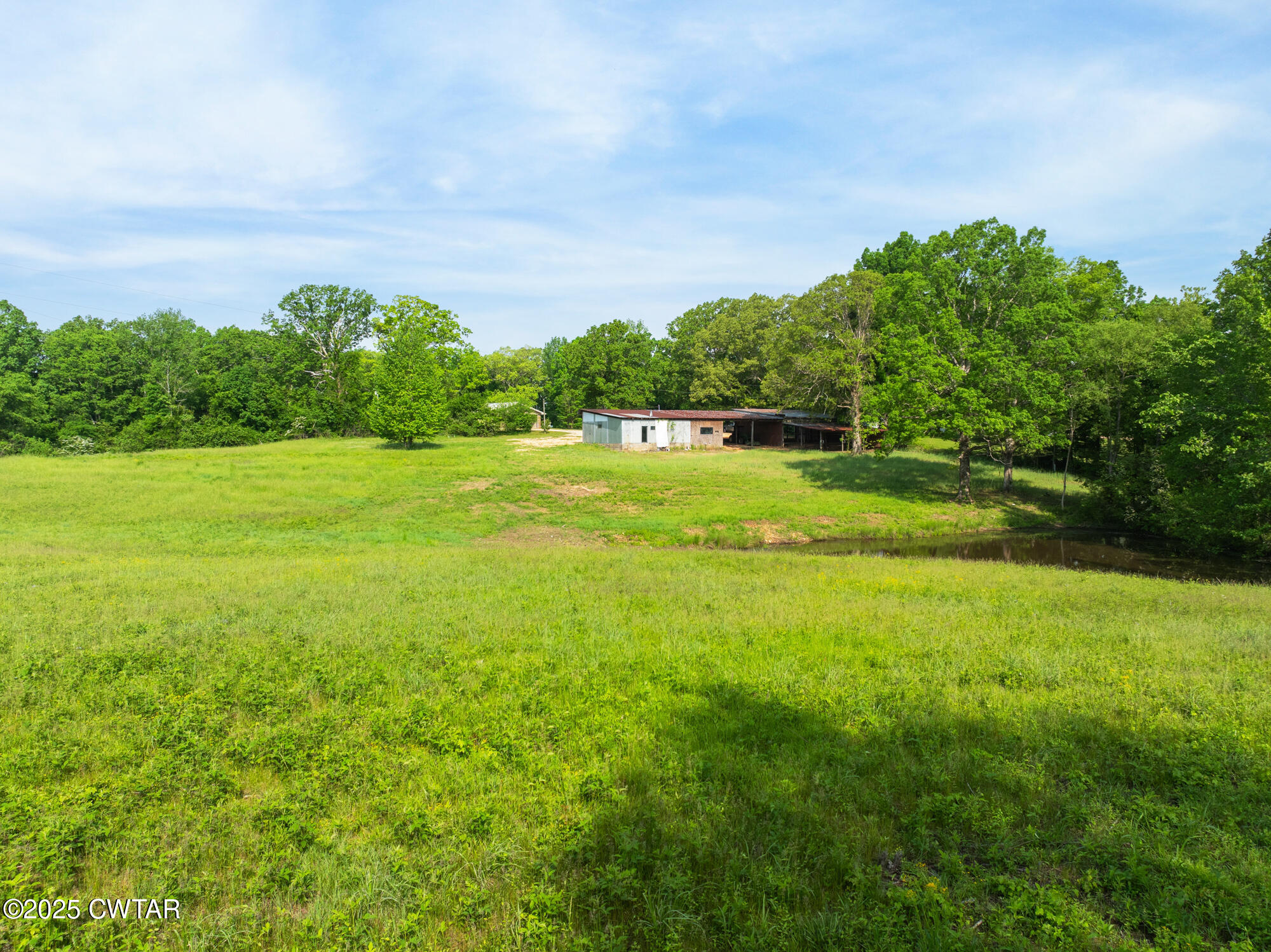 210 Martin Lane Decaturville, TN 38329 - Photo 35 of 48 DJI_20250430092633_0211_D