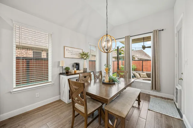 a bedroom with a bed and furniture