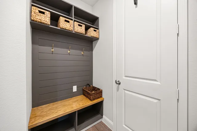 a view of a storage & utility room with a washer dryer