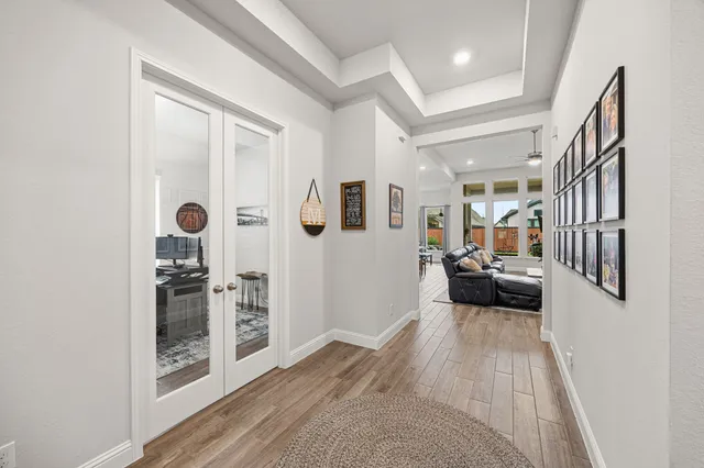 a dining room with table and chairs
