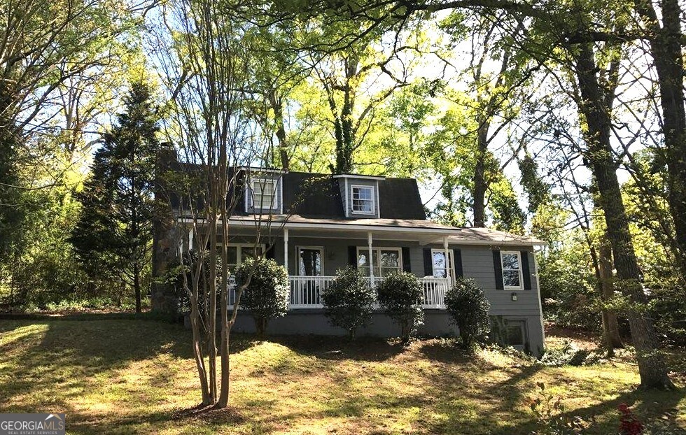 2 LaPorte Street Southeast Rome, GA 30161 - Photo 1 of 1 a front view of a house with a large tree