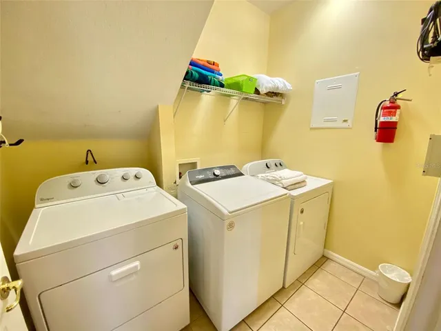 a bathroom with a sink mirror and toilet