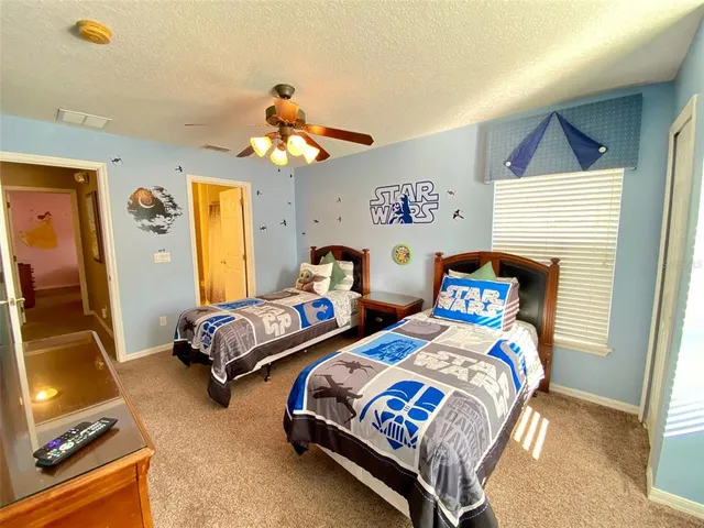 a reading room with furniture and window