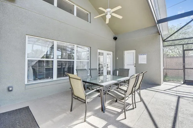 a view of a swimming pool with a patio