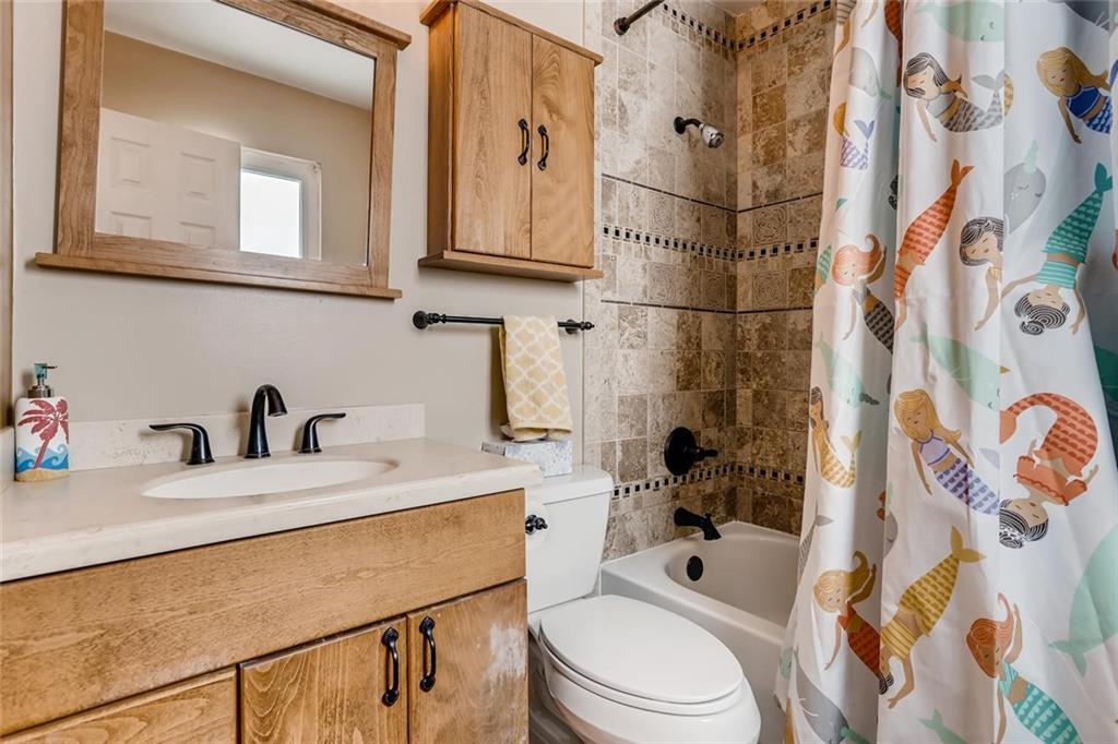 125 Reiling Road Breckenridge, CO 80424 - Photo 15 of 35 a bathroom with a sink a toilet and shower