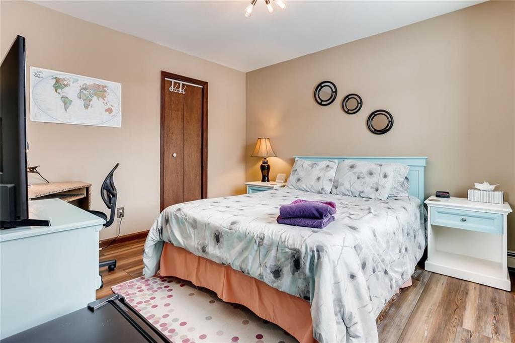 125 Reiling Road Breckenridge, CO 80424 - Photo 22 of 35 a bedroom with bed and a window