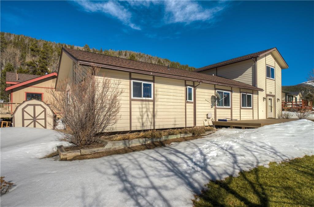 125 Reiling Road Breckenridge, CO 80424 - Photo 27 of 35 a view of a house with a yard