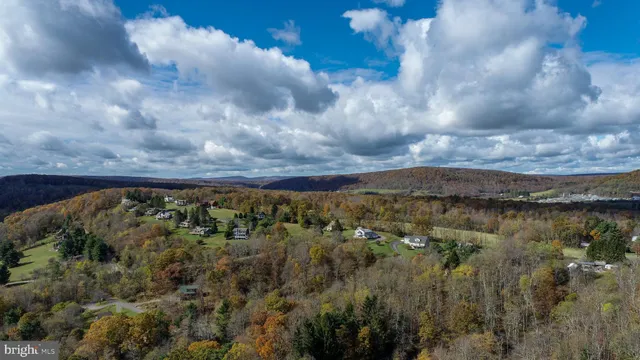 a view of lake with green space