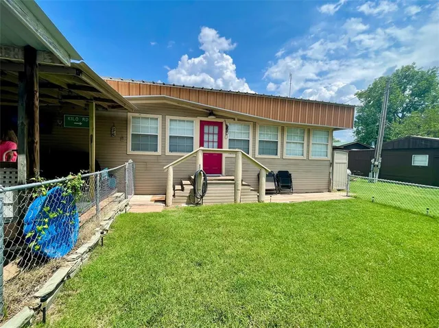 a car parked in front of a house