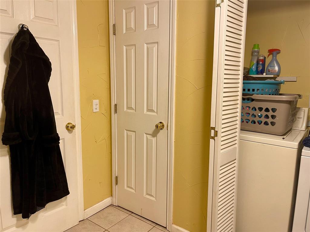 2334 San Bar Road, Unit 13 Graford, TX 76449 - Photo 15 of 33 a view of a hallway with wooden door