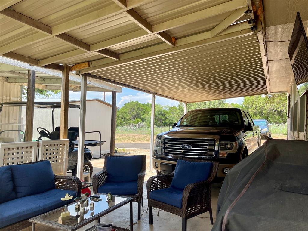 2334 San Bar Road, Unit 13 Graford, TX 76449 - Photo 25 of 33 a view of a chairs in the patio