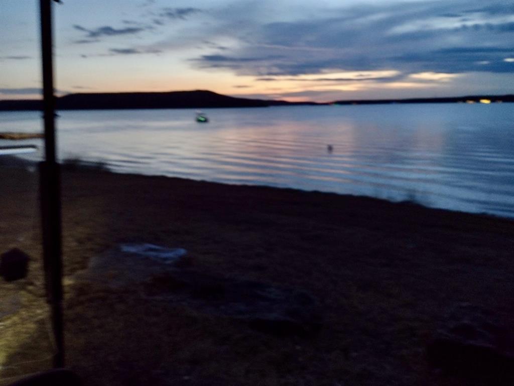 2334 San Bar Road, Unit 13 Graford, TX 76449 - Photo 30 of 33 a room view with hardwood floor