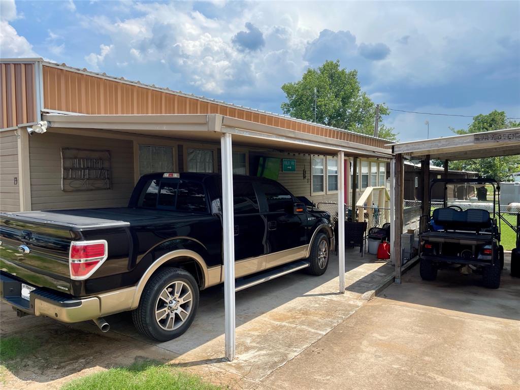 2334 San Bar Road, Unit 13 Graford, TX 76449 - Photo 3 of 33 a car parked in front of a house